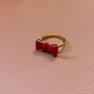 red and gold bowtie ring